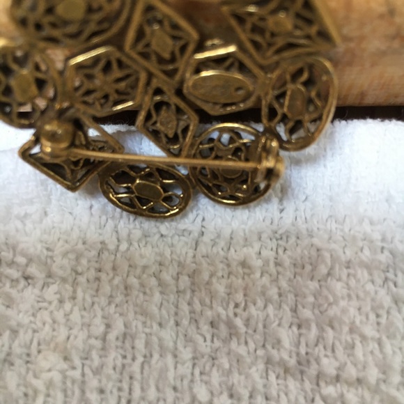 Vintage Goldette pin with multi stones, bee, snake, face and flowers
